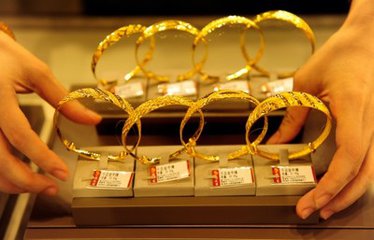 春节国内黄金售价1天1涨中国大妈带全球扫黄金