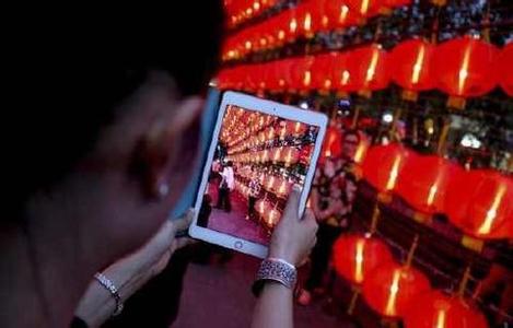 外媒:中国春节旅游市场红红火火国内游及出境游均井喷